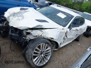 2018 Kia Stinger with VIN KNAE15LA1J6029913, listed as a IAAI auction lot 41477274 with 105,479 mi miles. Bid and sale history available at carsss.com. Image 2.