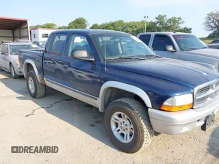 2004 Dodge Dakota SLT with VIN 1D7HG48N14S610012, listed as a IAAI auction lot 39853794 with 158,998 mi miles. Bid and sale history available at carsss.com. Image 1.