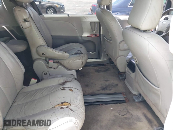 2014 Toyota Sienna XLE with VIN 5TDYK3DC4ES414728, listed as a IAAI auction lot 42588916 with 291,007 mi miles and . Bid and sale history available at DreamBid. Image 8.