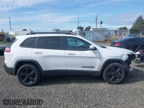 2019 Jeep Cherokee Latitude Plus with VIN 1C4PJMLX2KD432659, listed as a IAAI auction lot 42011291 with 76,015 mi miles. Bid and sale history available at carsss.com. Image 14.
