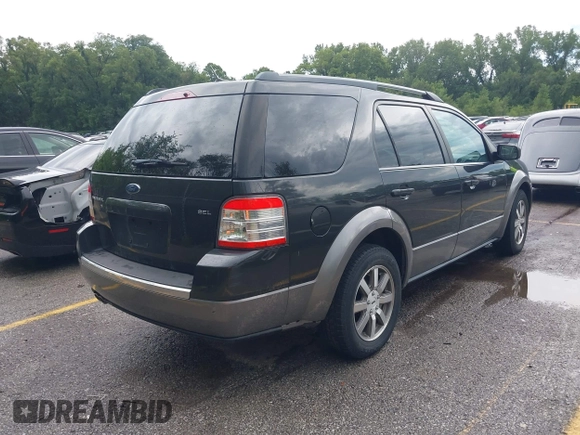 2008 Ford Taurus X SEL z VIN 1FMDK02W78GA05451, wystawiony jako IAAI lot #42772241 z przebiegiem 290 453 mil mil oraz . Historia ofert i sprzedaży dostępna na DreamBid. Obrazek 4.