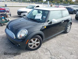 2010 MINI Hardtop with VIN WMWMF3C5XATU77265, listed as a IAAI auction lot 42007797 with 28,856 mi miles and . Bid and sale history available at DreamBid. Image 17.