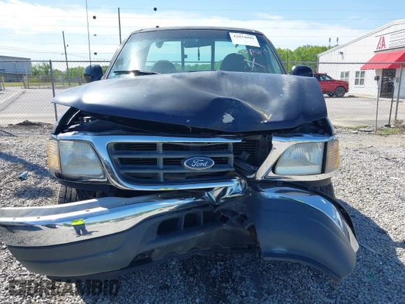 2000 Ford F-150 XL with VIN 1FTZF1828YNC09020, listed as a IAAI auction lot 42034099 with 167,692 mi miles and . Bid and sale history available at DreamBid. Image 12.