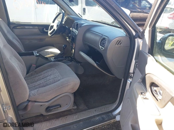 2004 GMC Envoy SLE with VIN 1GKDS13S942364463, listed as a IAAI auction lot 41658640 with 257,138 mi miles. Bid and sale history available at carsss.com. Image 5.