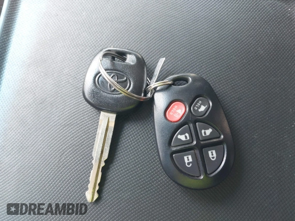 2014 Toyota Sienna XLE with VIN 5TDYK3DC9ES413283, listed as a IAAI auction lot 42091379 with 184,506 mi miles and . Bid and sale history available at DreamBid. Image 11.