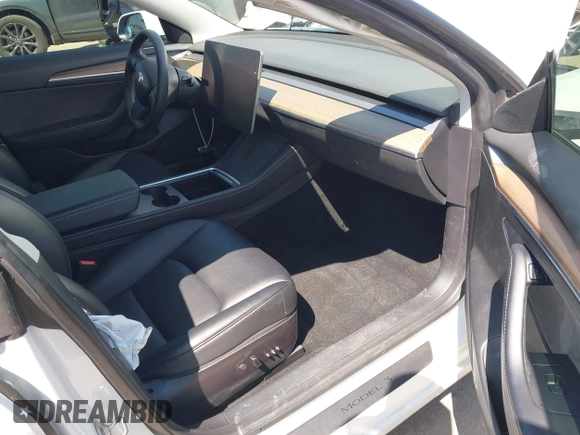 2022 Tesla Model 3 with VIN 5YJ3E1EA3NF294282, listed as a IAAI auction lot 41992046 with 22,383 mi miles. Bid and sale history available at carsss.com. Image 5.