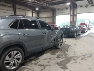 2021 Volkswagen Atlas SEL z VIN 1V2BE2CA6MC203777, wystawiony jako IAAI lot #42507511 z przebiegiem 76 358 mil mil oraz . Historia ofert i sprzedaży dostępna na DreamBid. Obrazek 18.