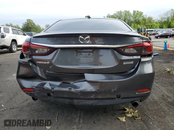 2017 Mazda 6 Grand Touring с VIN JM1GL1W55H1140064, выставлен на аукционе Copart как лот 57503425 с пробегом 74 304 миль миль и Списание • Salvage title. История ставок и продаж доступна на DreamBid. Изображение 6.