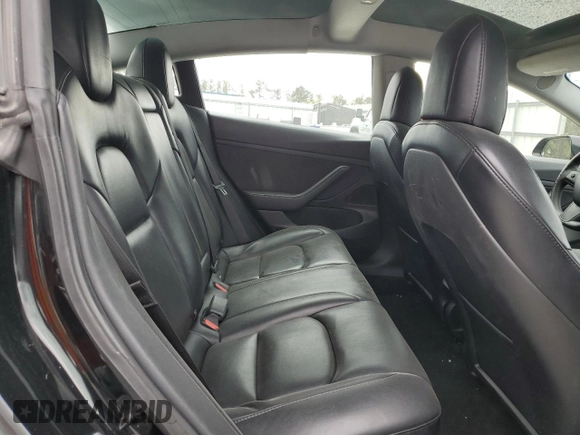 2021 Tesla Model 3 Standard Range Plus z VIN 5YJ3E1EA3MF854008, wystawiony jako Copart lot #49494315 z przebiegiem 220 354 mil mil oraz Tytuł czysty. Historia ofert i sprzedaży dostępna na DreamBid. Obrazek 10.