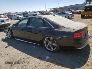 2013 Audi A8 3.0L with VIN WAURGAFD9DN004556, listed as a Copart auction lot 65018975 with 138,090 mi miles and Salvage title. Bid and sale history available at DreamBid. Image 2.