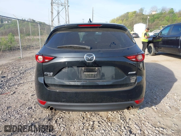 2018 Mazda CX-5 Grand Touring with VIN JM3KFBDM2J0463279, listed as a IAAI auction lot 42115309 with 68,851 mi miles. Bid and sale history available at carsss.com. Image 16.