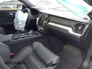 2024 Volvo S60 Plus Black Edition with VIN 7JRL12FH7RG300837, listed as a IAAI auction lot 42419110 with 9,765 mi miles and . Bid and sale history available at DreamBid. Image 5.
