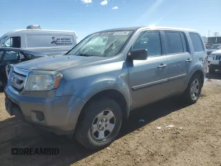 2009 Honda Pilot LX with VIN 5FNYF48269B038216, listed as a Copart auction lot 57124795 with 209,027 mi miles and Salvage title. Bid and sale history available at DreamBid. Image 1.