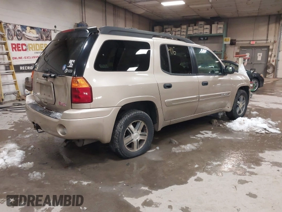 2004 GMC Envoy SLT with VIN 1GKET16S746148679, listed as a IAAI auction lot 41602991 with 196,621 mi miles and . Bid and sale history available at DreamBid. Image 4.