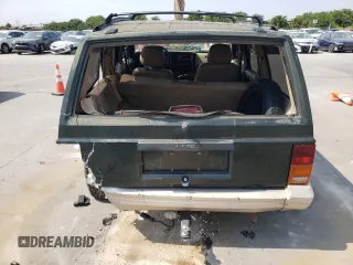 1995 Jeep Cherokee Country with VIN 1J4FJ78S4SL631318, listed as a Copart auction lot 63087634 with 295,577 mi miles and Salvage Title. Bid and sale history available at carsss.com. Image 6.