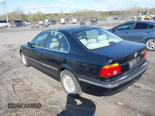 2000 BMW 5 Series 528iA with VIN WBADM6348YGU11038, listed as a IAAI auction lot 41961847 with 195,493 mi miles. Bid and sale history available at carsss.com. Image 3.