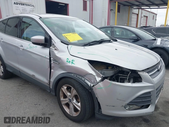 2015 Ford Escape SE with VIN 1FMCU0G95FUC81490, listed as a IAAI auction lot 42136791 with 140,967 mi miles. Bid and sale history available at carsss.com. Image 6.