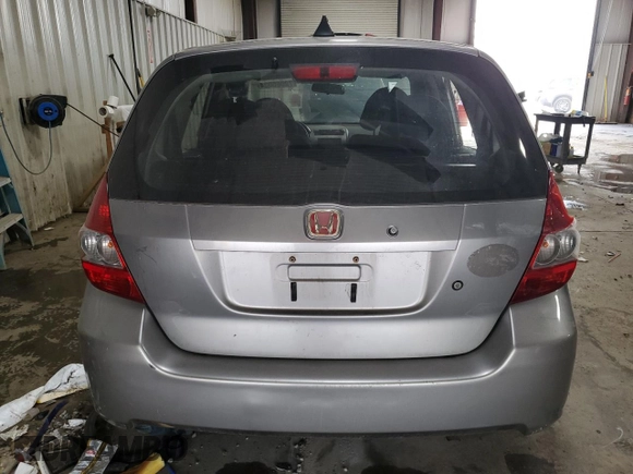 2007 Honda Fit with VIN JHMGD38437S002477, listed as a Copart auction lot 72065034 with 59,192 mi miles and Salvage Title. Bid and sale history available at carsss.com. Image 6.