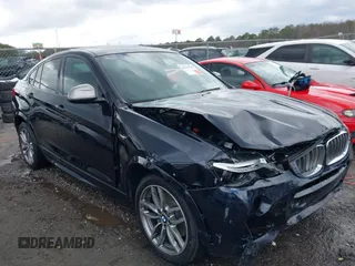 2018 BMW X4 M40i z VIN 5UXXW7C52J0W63809, wystawiony jako IAAI lot #41715259 z przebiegiem 90 887 mil mil oraz . Historia ofert i sprzedaży dostępna na DreamBid. Obrazek 1.