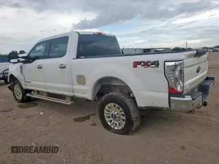 2017 Ford F-250 Lariat with VIN 1FT7W2BT8HED31603, listed as a Copart auction lot 62475025 with 105,293 mi miles and Salvage title. Bid and sale history available at DreamBid. Image 2.