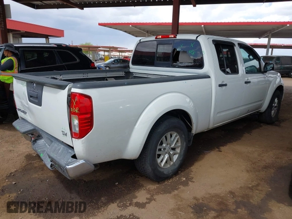 2016 Nissan Frontier SV with VIN 1N6AD0FR2GN718755, listed as a IAAI auction lot 41954330 with 114,380 mi miles and . Bid and sale history available at DreamBid. Image 4.