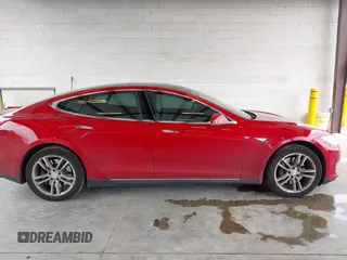2013 Tesla Model S with VIN 5YJSA1CN7DFP26996, listed as a IAAI auction lot 42244540 with 128,160 mi miles and . Bid and sale history available at DreamBid. Image 13.
