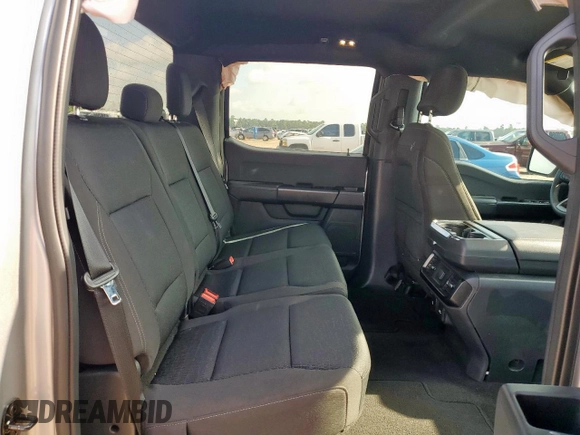 2023 Ford F-150 XL with VIN 1FTEW1CP0PKD18024, listed as a Copart auction lot 64282415 with 96,095 mi miles and Salvage title. Bid and sale history available at DreamBid. Image 10.