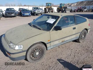 1989 Honda Civic z VIN JHMED8368KS023055, wystawiony jako IAAI lot #42017265 z przebiegiem 191 370 mil mil oraz . Historia ofert i sprzedaży dostępna na DreamBid. Obrazek 2.
