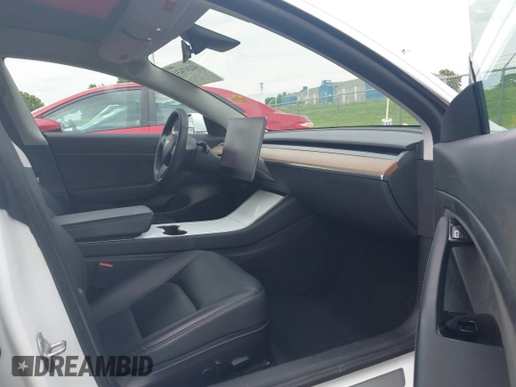 2020 Tesla Model 3 Standard Range Plus z VIN 5YJ3E1EA9LF598682, wystawiony jako IAAI lot #42247434 z przebiegiem 28 835 mil mil oraz . Historia ofert i sprzedaży dostępna na DreamBid. Obrazek 5.