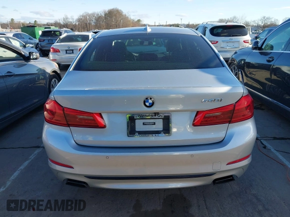 2019 BMW 5 Series 540i with VIN WBAJE5C58KWE66057, listed as a IAAI auction lot 41721886 with 119,712 mi miles and . Bid and sale history available at DreamBid. Image 16.