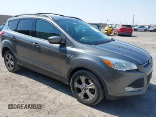 2014 Ford Escape SE z VIN 1FMCU9G98EUD25727, wystawiony jako IAAI lot #42726312 z przebiegiem 162 570 mil mil oraz . Historia ofert i sprzedaży dostępna na DreamBid. Obrazek 1.
