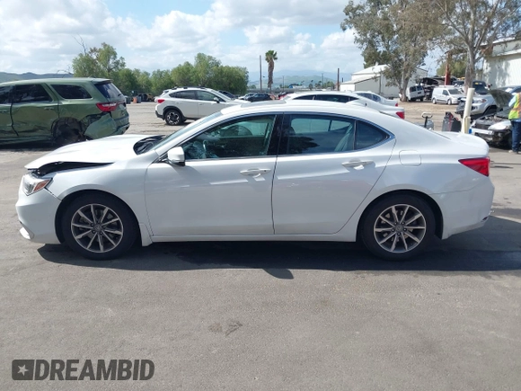 2020 Acura TLX w/Technology Pkg with VIN 19UUB1F56LA008852, listed as a IAAI auction lot 41904628 with 121,478 mi miles. Bid and sale history available at carsss.com. Image 14.