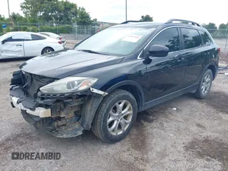 2015 Mazda CX-9 Touring with VIN JM3TB2CA4F0465730, listed as a IAAI auction lot 42512203 with 179,805 mi miles and . Bid and sale history available at DreamBid. Image 20.