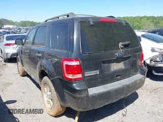 2011 Ford Escape XLT with VIN 1FMCU0D7XBKA54899, listed as a IAAI auction lot 42035816 with 180,770 mi miles. Bid and sale history available at carsss.com. Image 3.