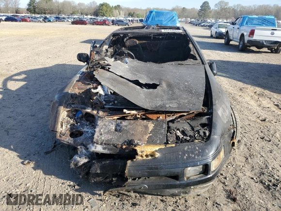 1990 Nissan 300ZX z VIN GZ32002975, wystawiony jako Copart lot #49444665 z przebiegiem Nie podano mil oraz Szkoda całkowita • Salvage title. Historia ofert i sprzedaży dostępna na DreamBid. Obrazek 5.