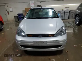 2003 Ford Focus LX z VIN 1FAFP33P03W313279, wystawiony jako Copart lot #89271495 z przebiegiem 152 672 mil mil oraz Szkoda całkowita • Salvage title. Historia ofert i sprzedaży dostępna na DreamBid. Obrazek 5.