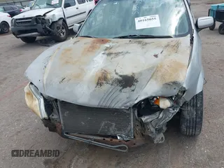2002 Mazda Protege DX z VIN JM1BJ225921576001, wystawiony jako IAAI lot #40165055 z przebiegiem Nie podano mil oraz . Historia ofert i sprzedaży dostępna na DreamBid. Obrazek 6.