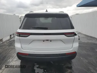 2024 Jeep Grand Cherokee Altitude with VIN 1C4RJGAG7R8546530, listed as a Copart auction lot 76833584 with 9,456 mi miles and Clean title. Bid and sale history available at DreamBid. Image 6.