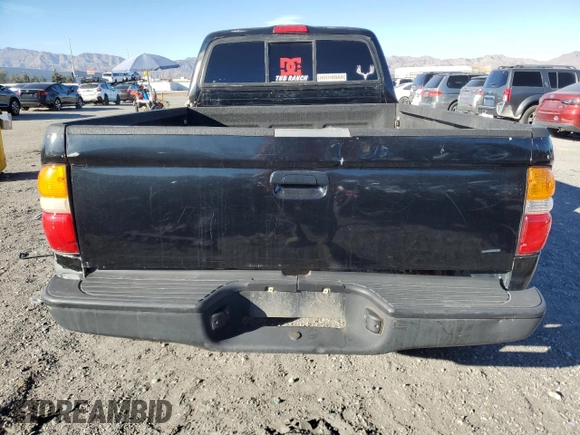 2002 Toyota Tacoma z VIN 5TEWN72N72Z094426, wystawiony jako Copart lot #45386145 z przebiegiem 159 355 mil mil oraz Szkoda całkowita • Salvage title. Historia ofert i sprzedaży dostępna na DreamBid. Obrazek 6.