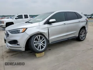 2019 Ford Edge Titanium z VIN 2FMPK3K99KBC19512, wystawiony jako Copart lot #56512305 z przebiegiem 94 107 mil mil oraz Szkody całkowita. Historia ofert i sprzedaży dostępna na DreamBid. Obrazek 1.
