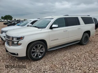 2015 Chevrolet Suburban LTZ with VIN 1GNSKKKCXFR518330, listed as a Copart auction lot 59083695 with 137,178 mi miles and Salvage title. Bid and sale history available at DreamBid. Image 1.