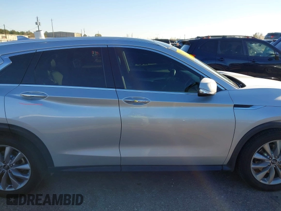 2020 Infiniti QX50 Luxe z VIN 3PCAJ5M37LF105904, wystawiony jako IAAI lot #41251242 z przebiegiem 66 806 mil mil oraz . Historia ofert i sprzedaży dostępna na DreamBid. Obrazek 13.