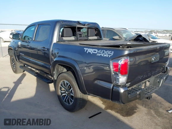 2023 Toyota Tacoma 4WD SR with VIN 3TMCZ5AN7PM587833, listed as a IAAI auction lot 41853887 with 16,532 mi miles. Bid and sale history available at carsss.com. Image 3.