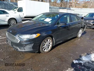 2020 Ford Fusion SE z VIN 3FA6P0LU4LR158954, wystawiony jako IAAI lot #41474425 z przebiegiem 76 966 mil mil oraz . Historia ofert i sprzedaży dostępna na DreamBid. Obrazek 17.