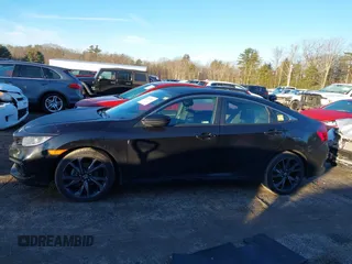 2019 Honda Civic Sport with VIN 2HGFC2F84KH514704, listed as a IAAI auction lot 41225362 with 43,111 mi miles and . Bid and sale history available at DreamBid. Image 14.