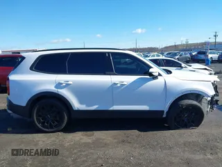 2022 Kia Telluride SX z VIN 5XYP5DHC2NG299501, wystawiony jako IAAI lot #41816830 z przebiegiem 61 413 mil mil oraz . Historia ofert i sprzedaży dostępna na DreamBid. Obrazek 14.