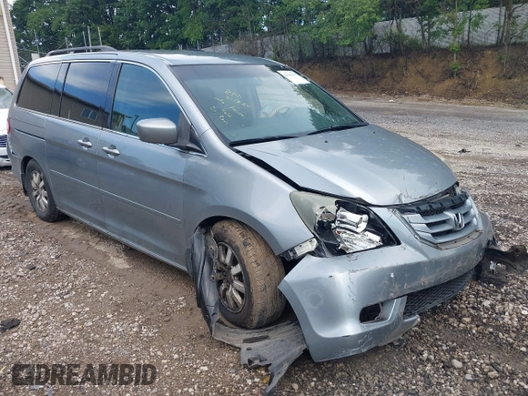 2010 Honda Odyssey EX with VIN 5FNRL3H4XAB015955, listed as a IAAI auction lot 42590535 with Not provided miles and . Bid and sale history available at DreamBid. Image 1.