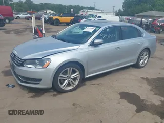 2014 Volkswagen Passat SE with VIN 1VWBT7A37EC039074, listed as a IAAI auction lot 42439583 with 109,654 mi miles and . Bid and sale history available at DreamBid. Image 2.