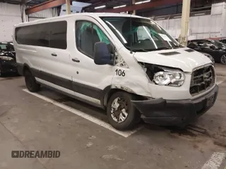 2019 Ford Transit Passenger XL with VIN 1FBZX2ZM8KKB24761, listed as a IAAI auction lot 40978107 with 153,669 mi miles. Bid and sale history available at carsss.com. Image 1.