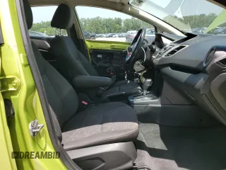 2013 Ford Fiesta SE z VIN 3FADP4EJ1DM153422, wystawiony jako Copart lot #56376105 z przebiegiem 110 761 mil mil oraz Szkoda całkowita • Salvage title. Historia ofert i sprzedaży dostępna na DreamBid. Obrazek 7.